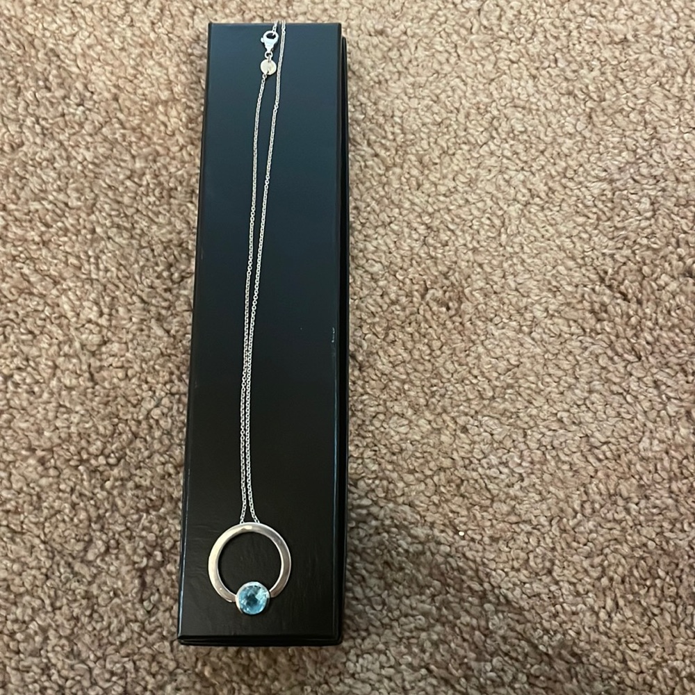 Movado sterling silver circle necklace with stone